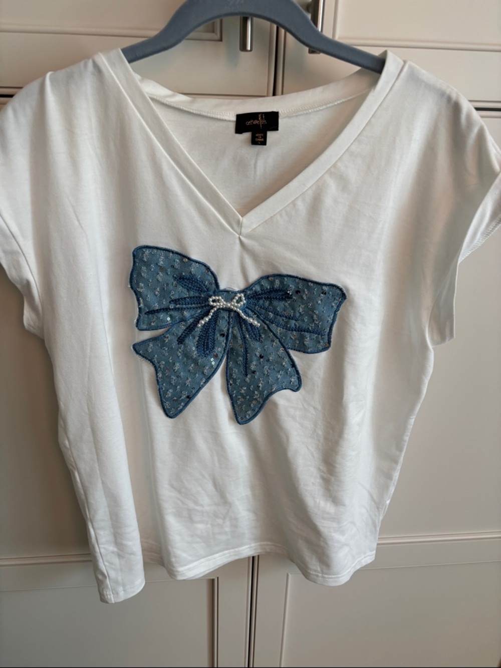 White V-Neck Tee with Blue Bow Applique